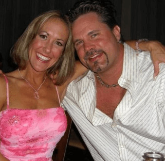 Chris Potoski with his wife, Brandi Love